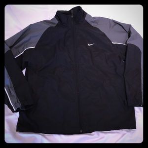 Nike zip up black and silver jacket size L